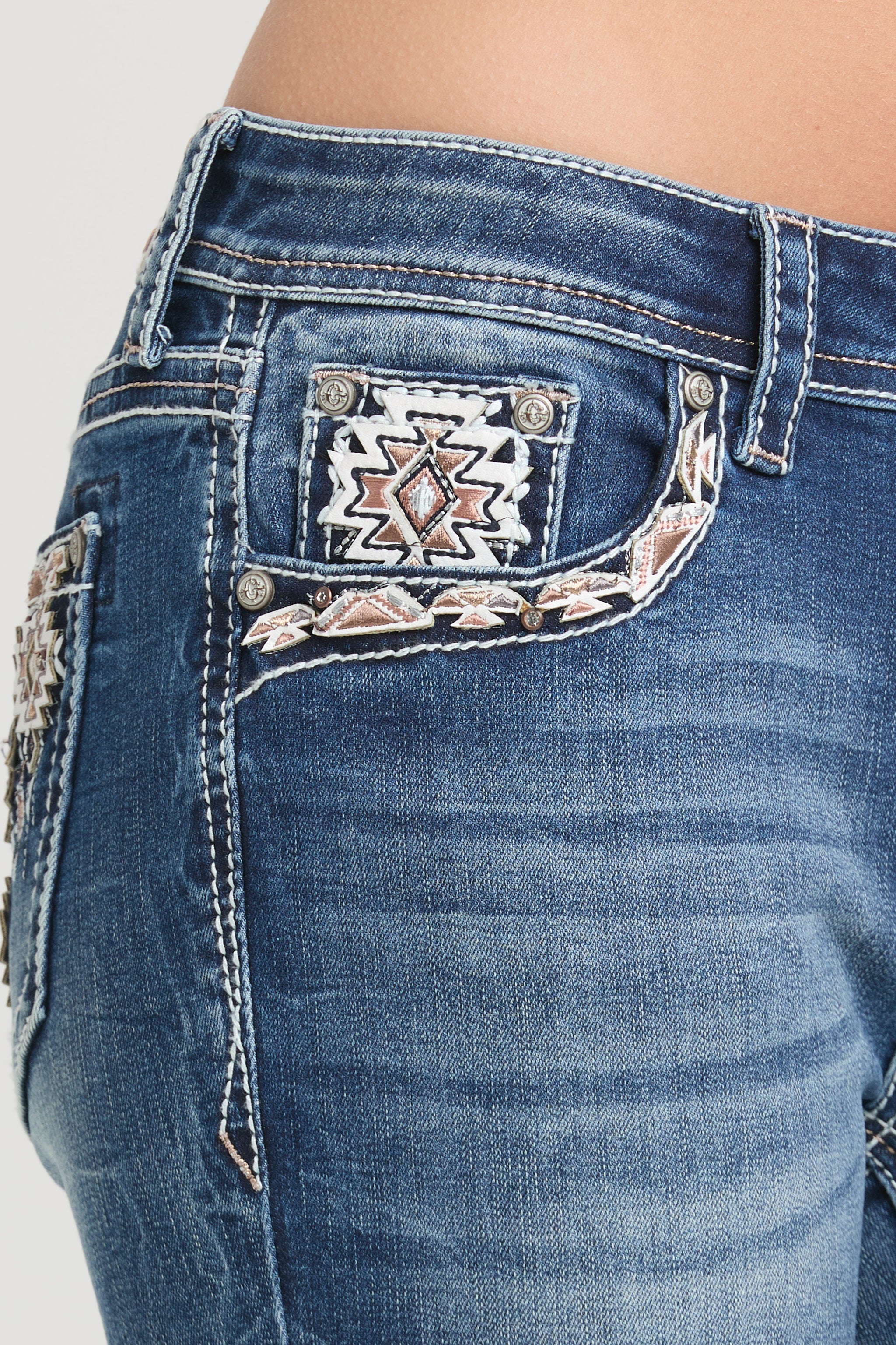 Grace in LA womens bootcut jeans with western embroidered southwestern geometric front pocket patch.