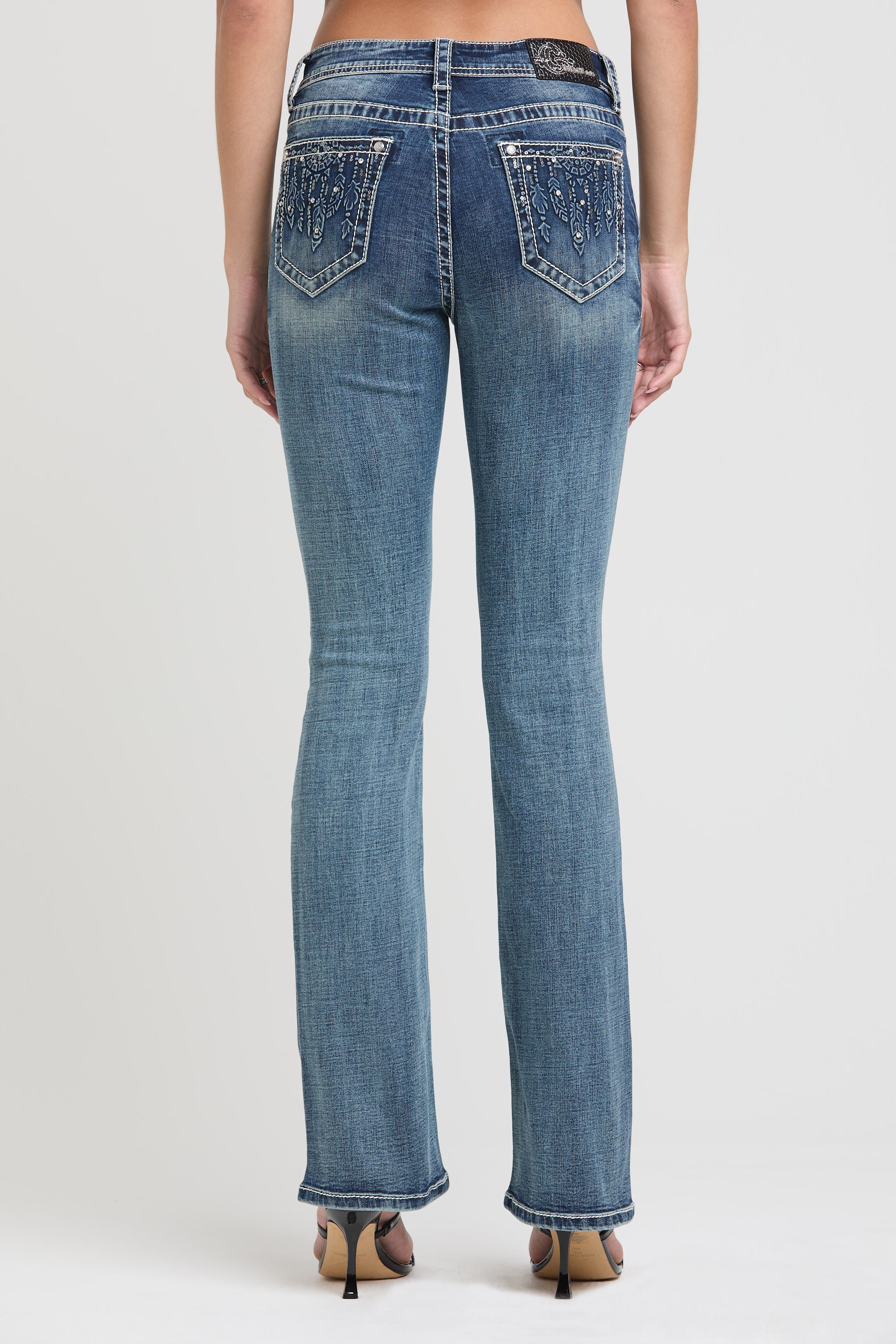 Grace in LA womens bootcut jeans back view with sparkly rhinestone and sequin embellished pockets.