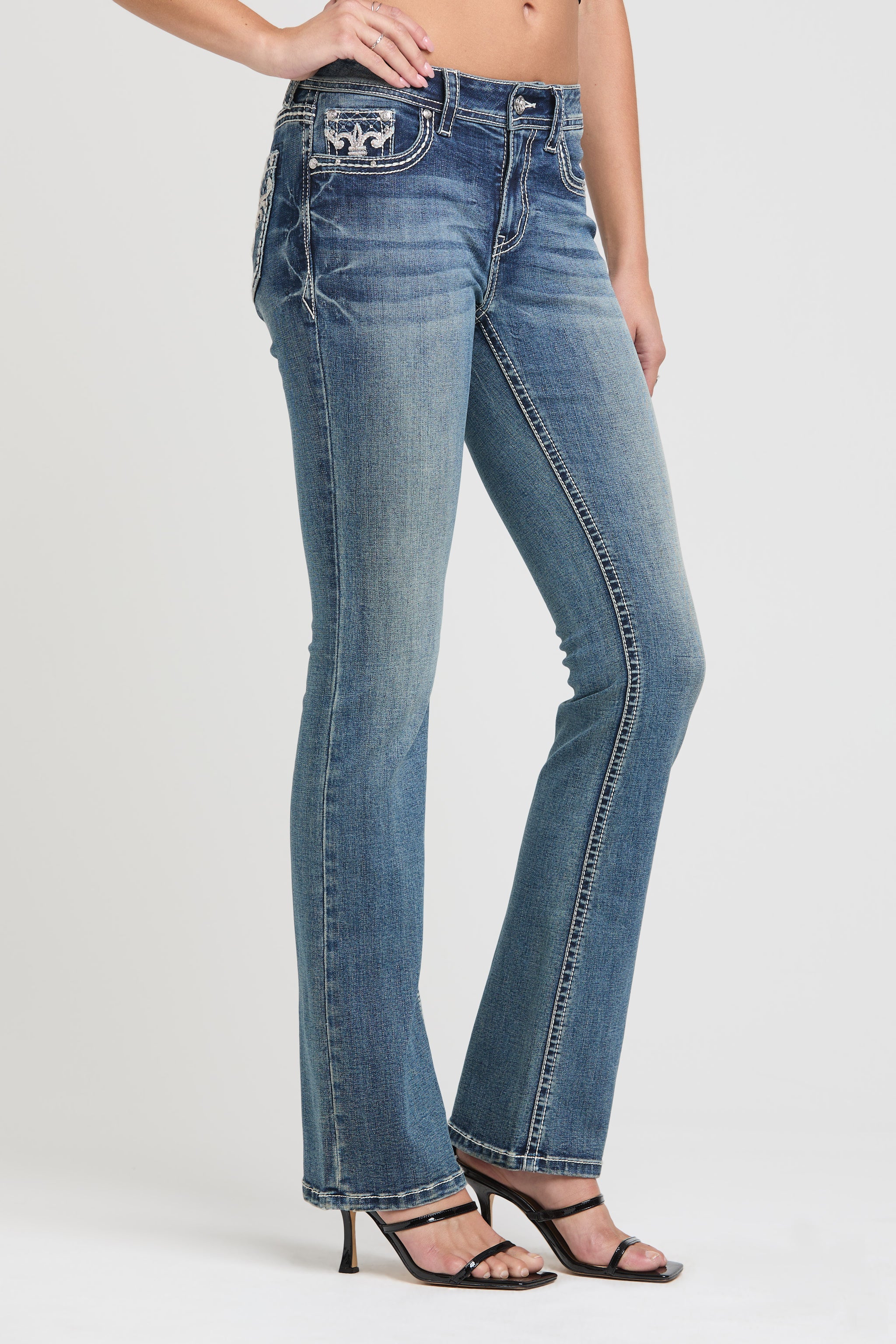 Womens bootcut jeans side profile highlighting the leg silhouette and vintage wash of Grace in LA.