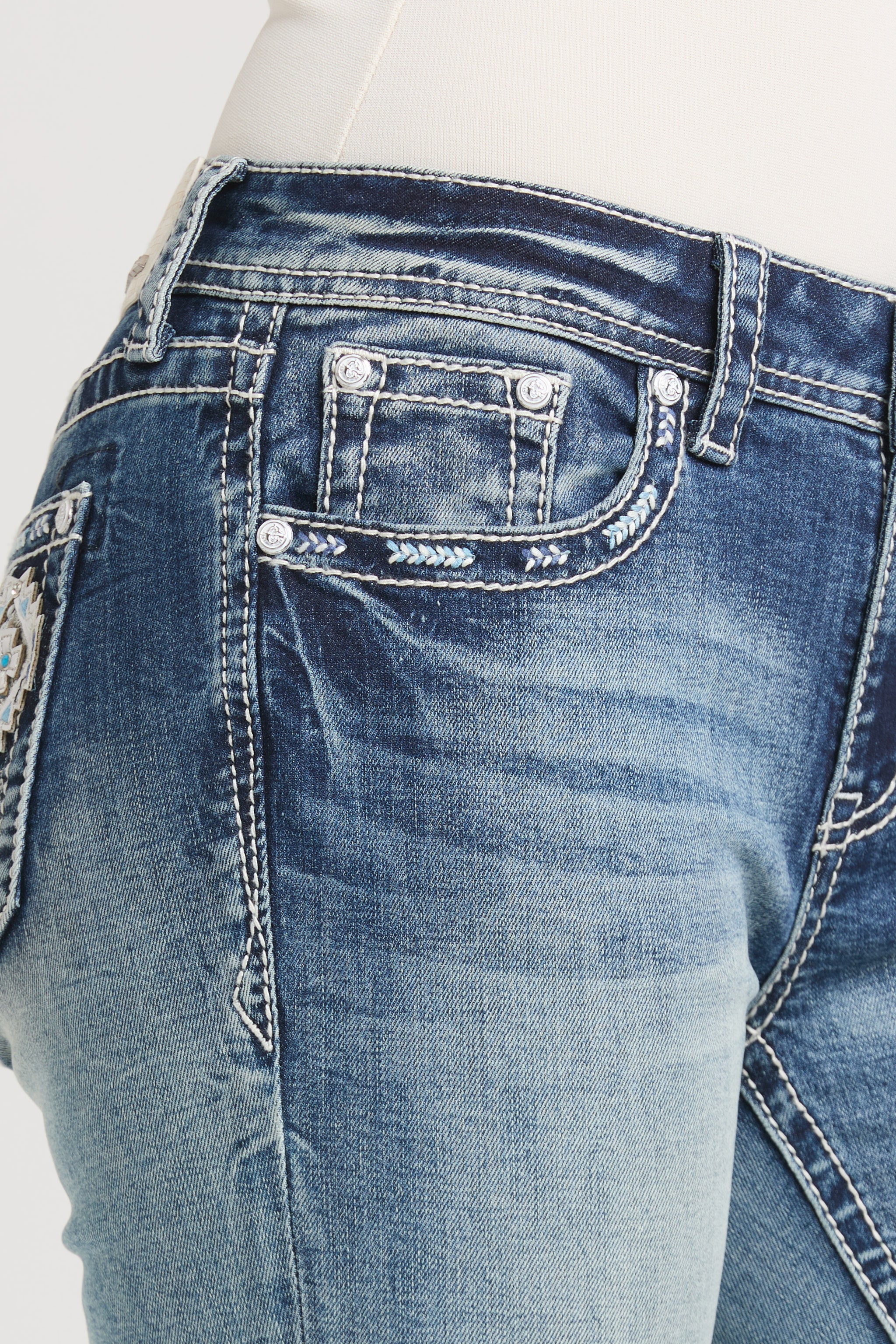 Close-up of the front pocket and decorative stitching on Grace in LA womens bootcut jeans.