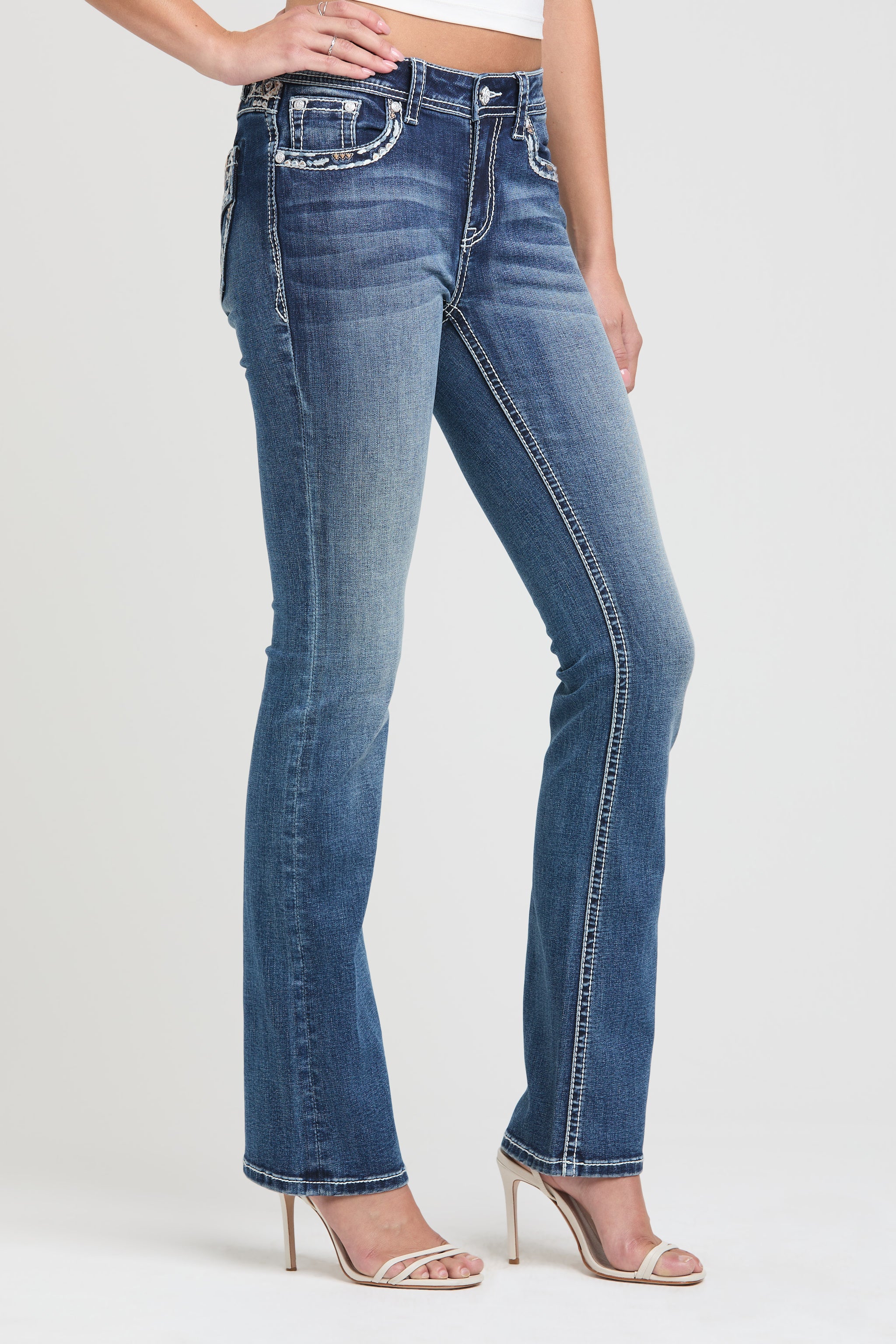 Grace in LA Women's Western Slim Fit Jeans - Side Profile of Medium Wash Denim with Aztec Waistband and Pocket Detail