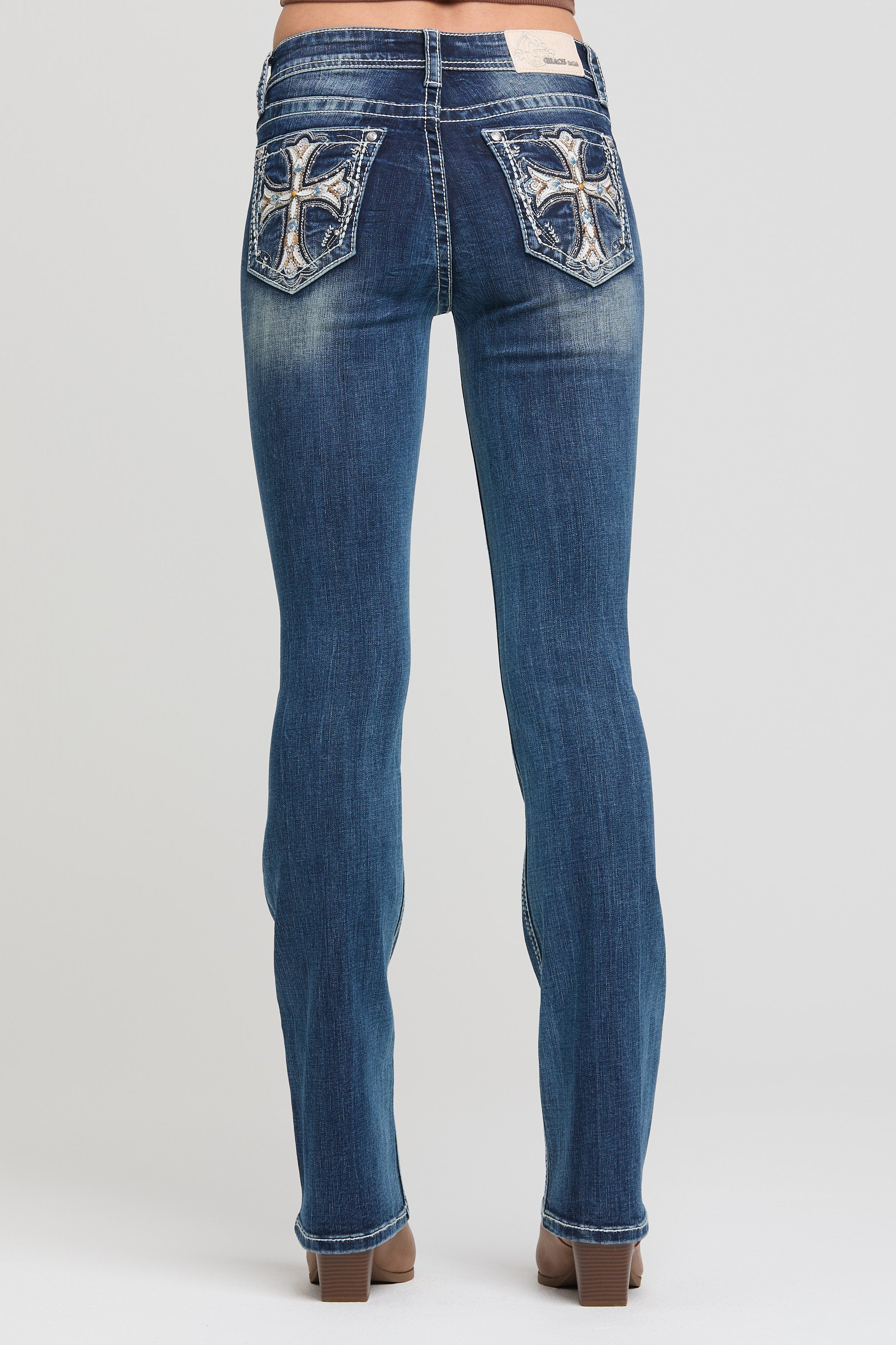 Grace in LA women’s embroidered pocket bootcut jeans medium wash full back view with cross pocket design