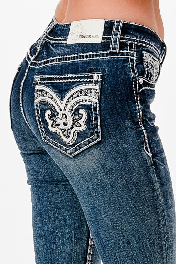 Grace in LA womens flare jeans with western embroidered rhinestone fleur-de-lis back pocket.