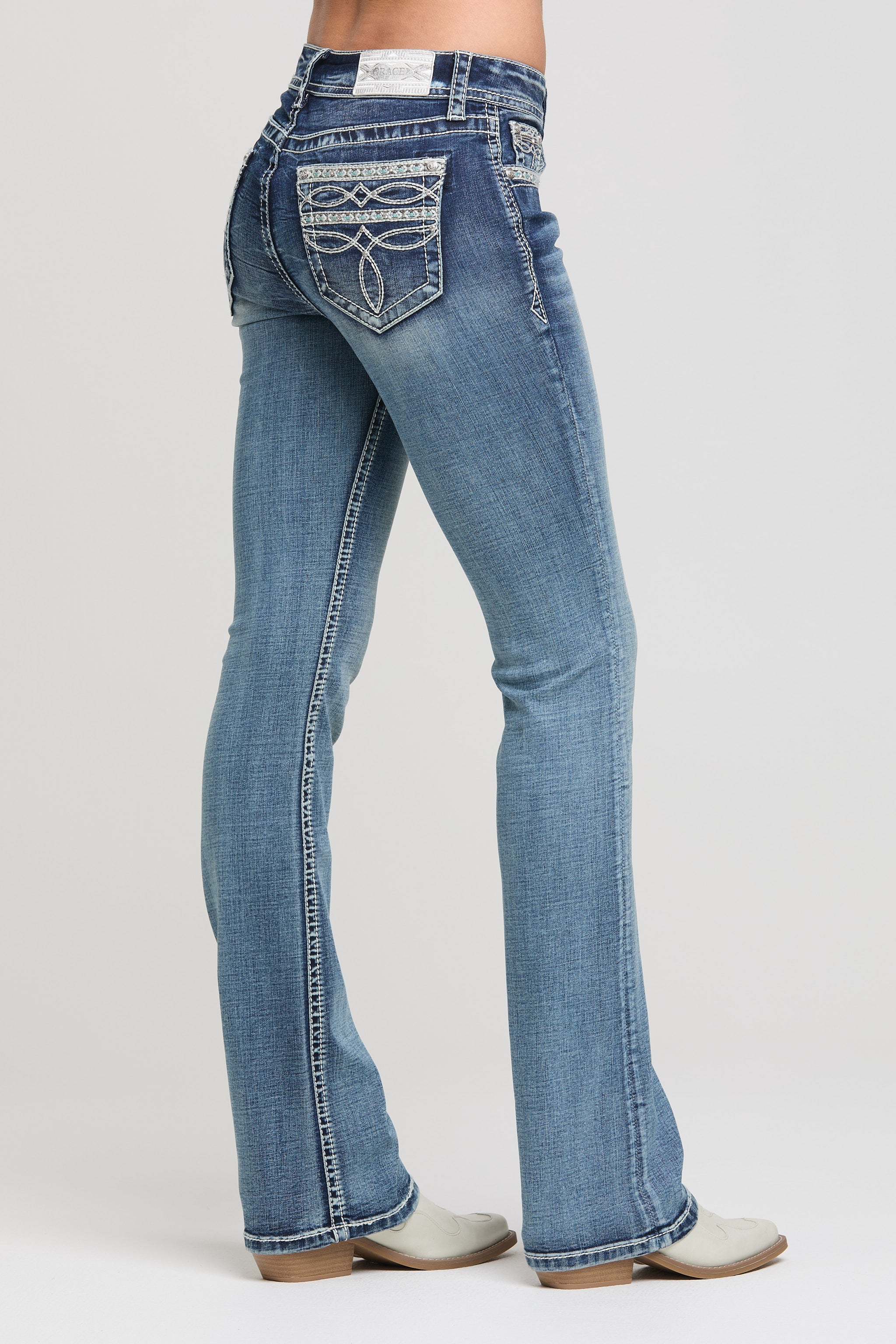 Grace in LA bootcut jeans back pocket detail featuring western embroidery stitching
