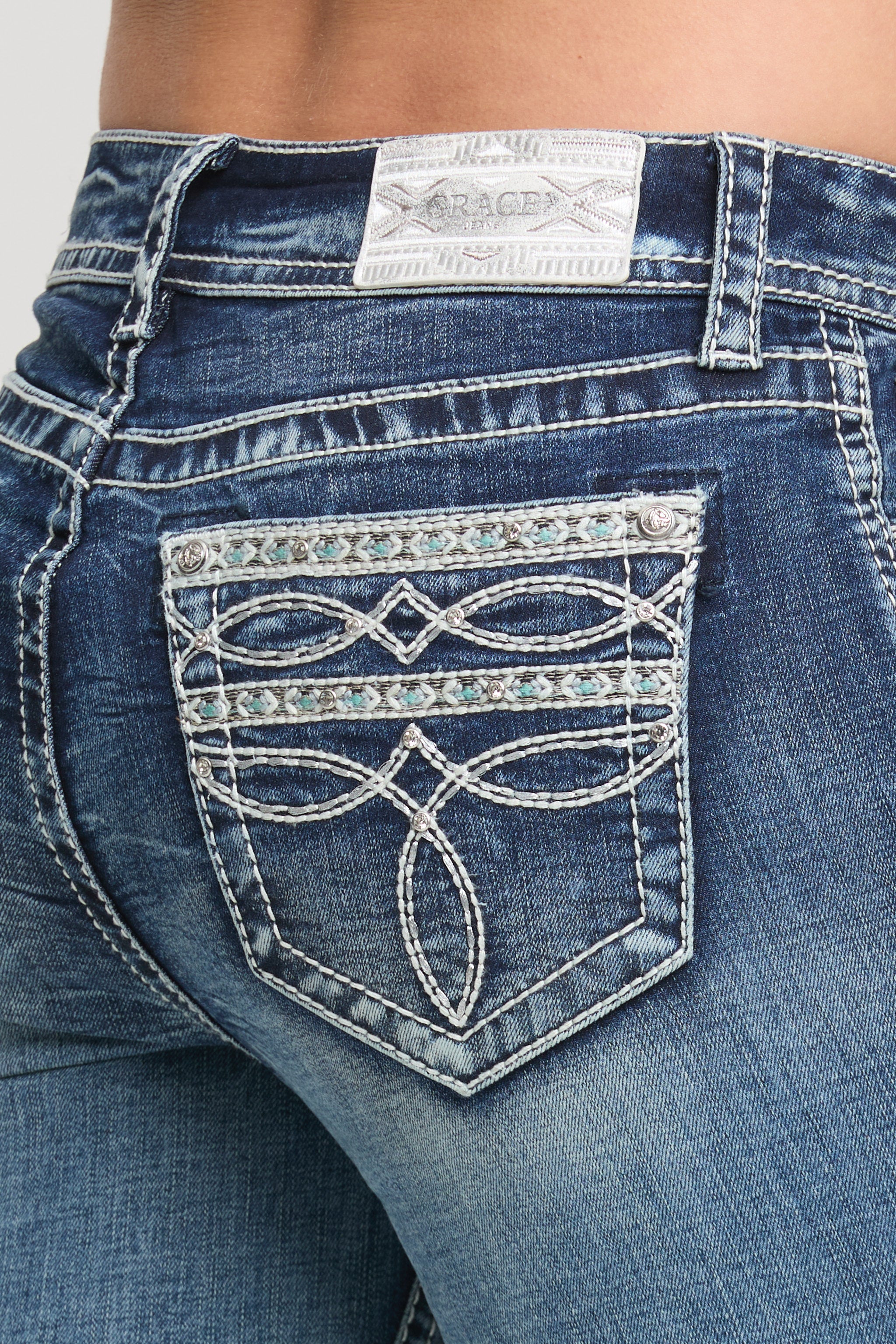 Grace in LA women's medium wash mid-rise bootcut jeans, front-facing view with western embroidery detailing