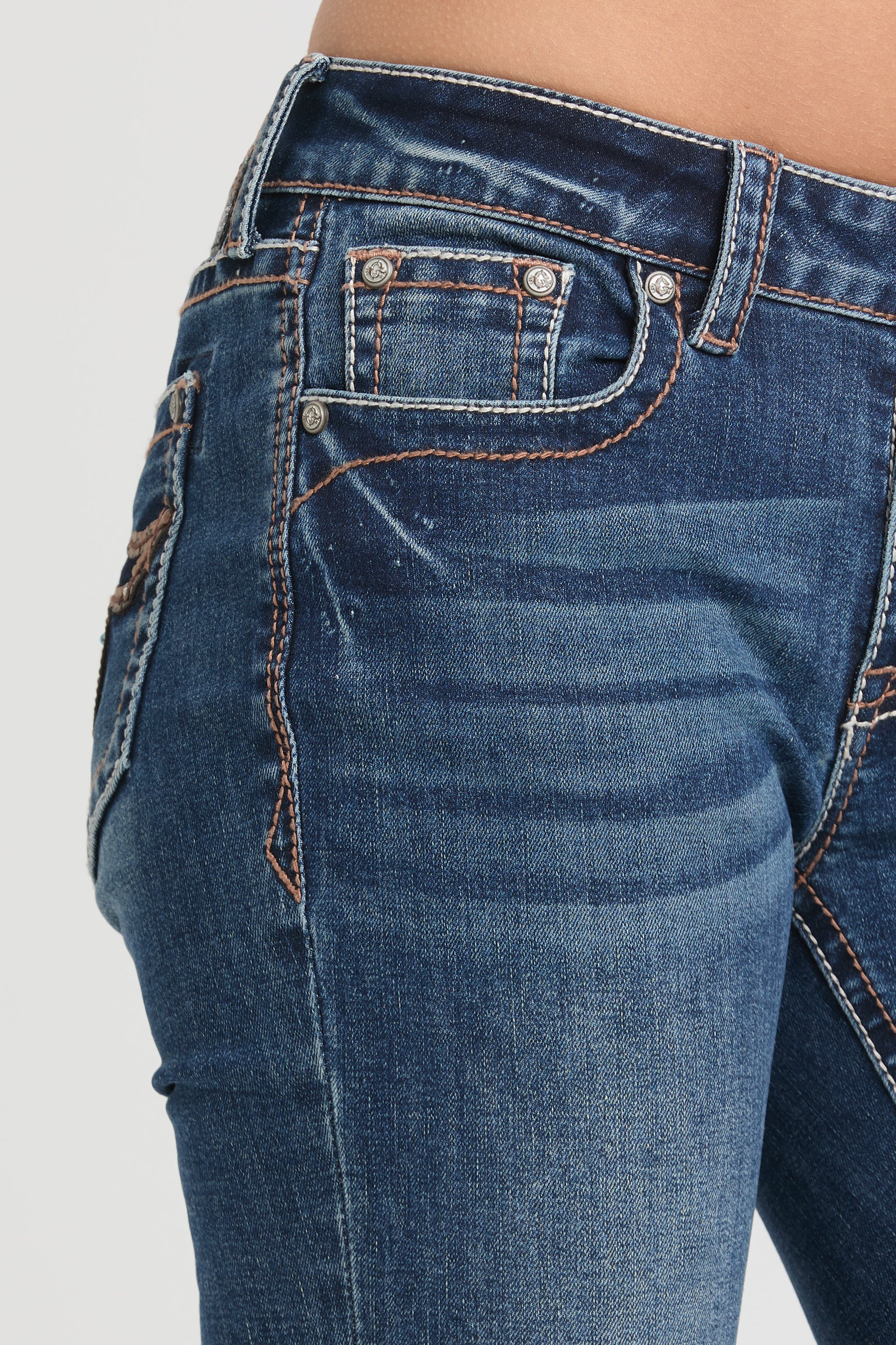 Grace in LA womens bootcut jeans featuring orange western scroll embroidery on the back pockets and heavy whiskering.