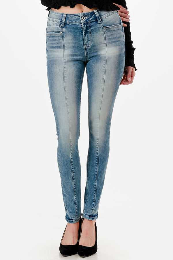 Grace in LA western jeans for women featuring a light wash, high-waisted skinny fit, and unique vertical front seam paneling.