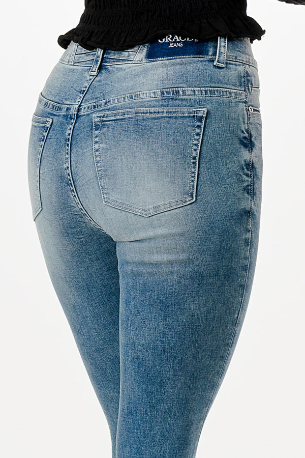 Grace in LA western jeans for women featuring a high-waisted skinny fit with a light wash and classic clean back pockets.