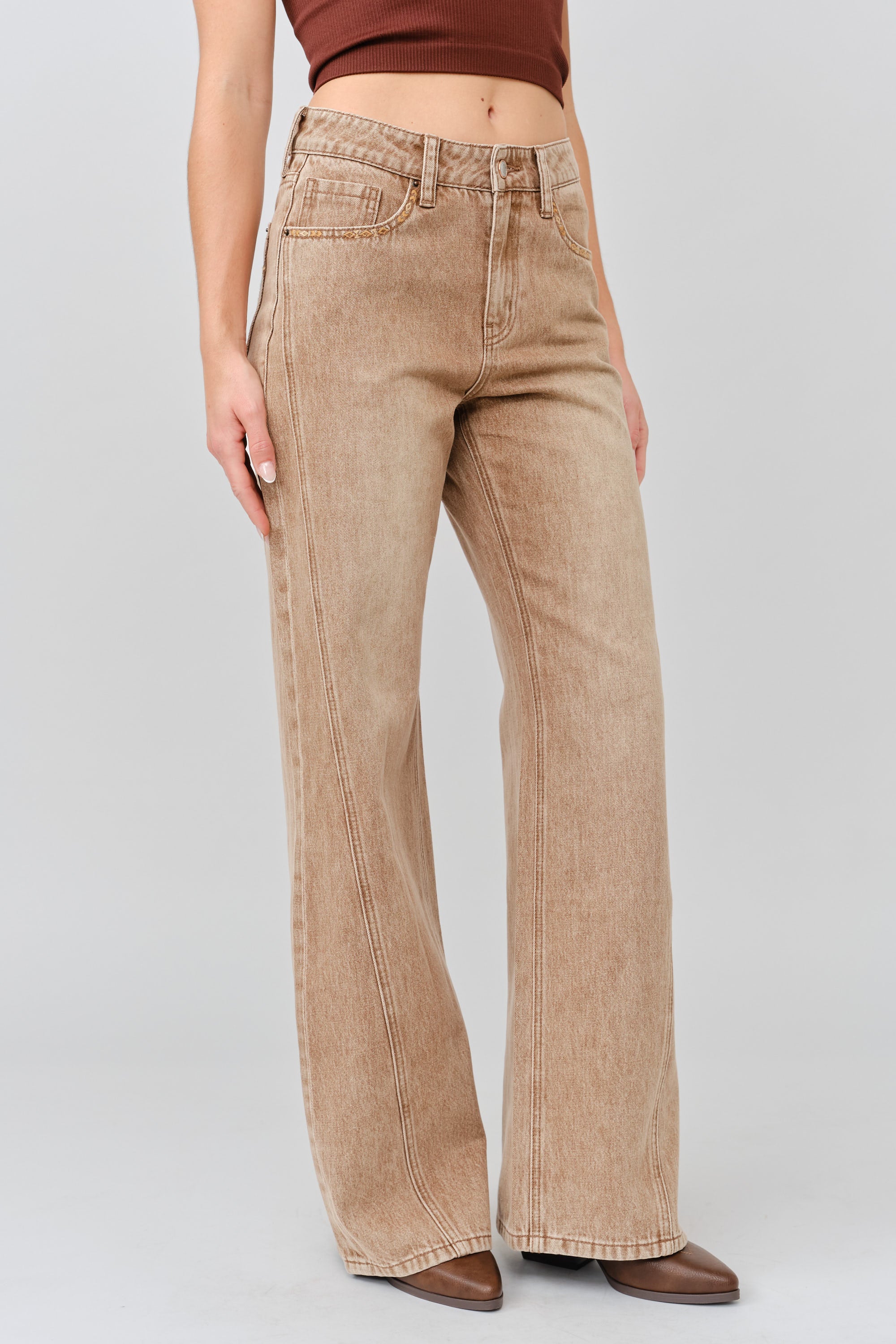 Grace in LA women's light wash flare jeans, front-facing view showing the fitted silhouette and flared hem