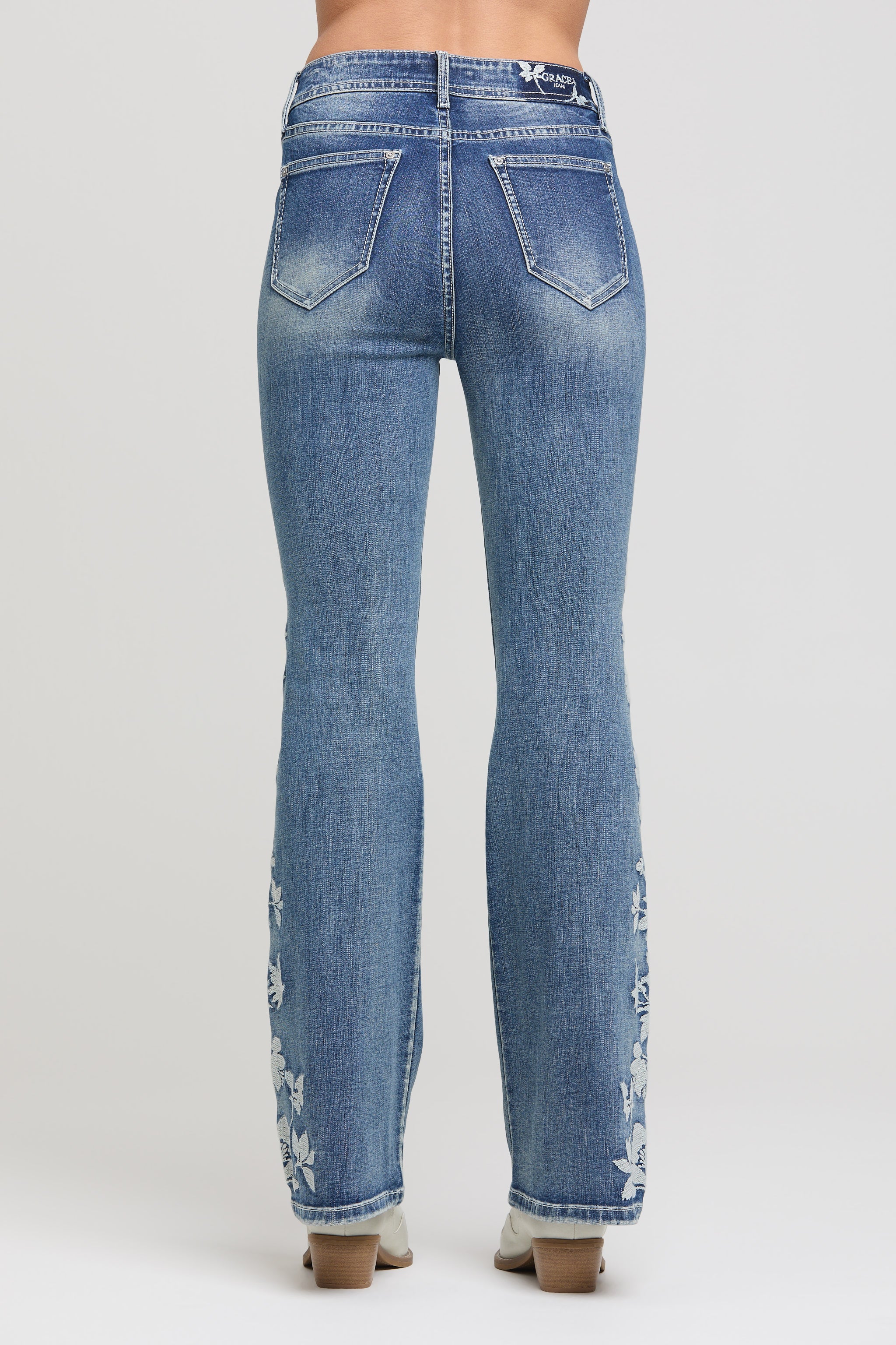 Grace in LA Women's Flared Jeans with White Floral Embroidery - Back View Western Denim Style