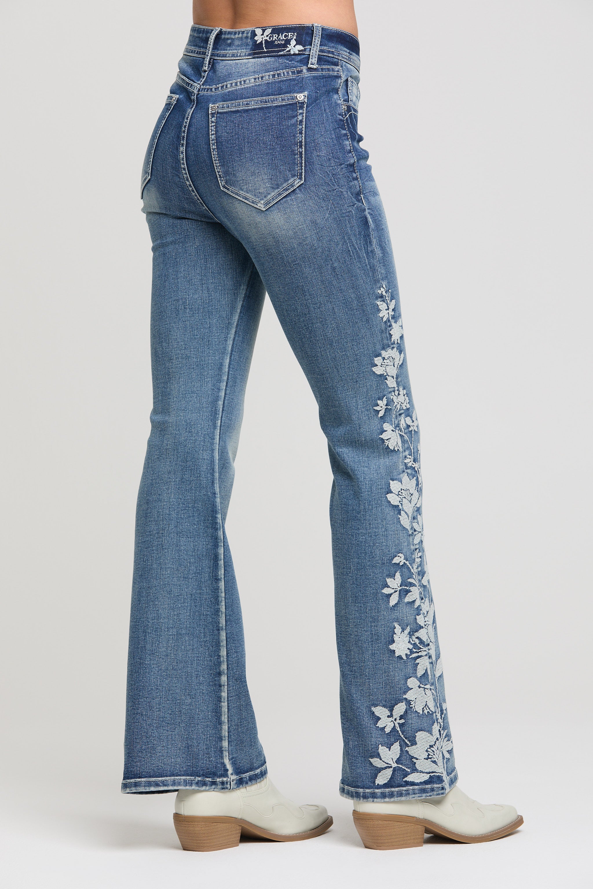 Grace in LA Women's Flare Jeans featuring White Floral Embroidery and Western Styling