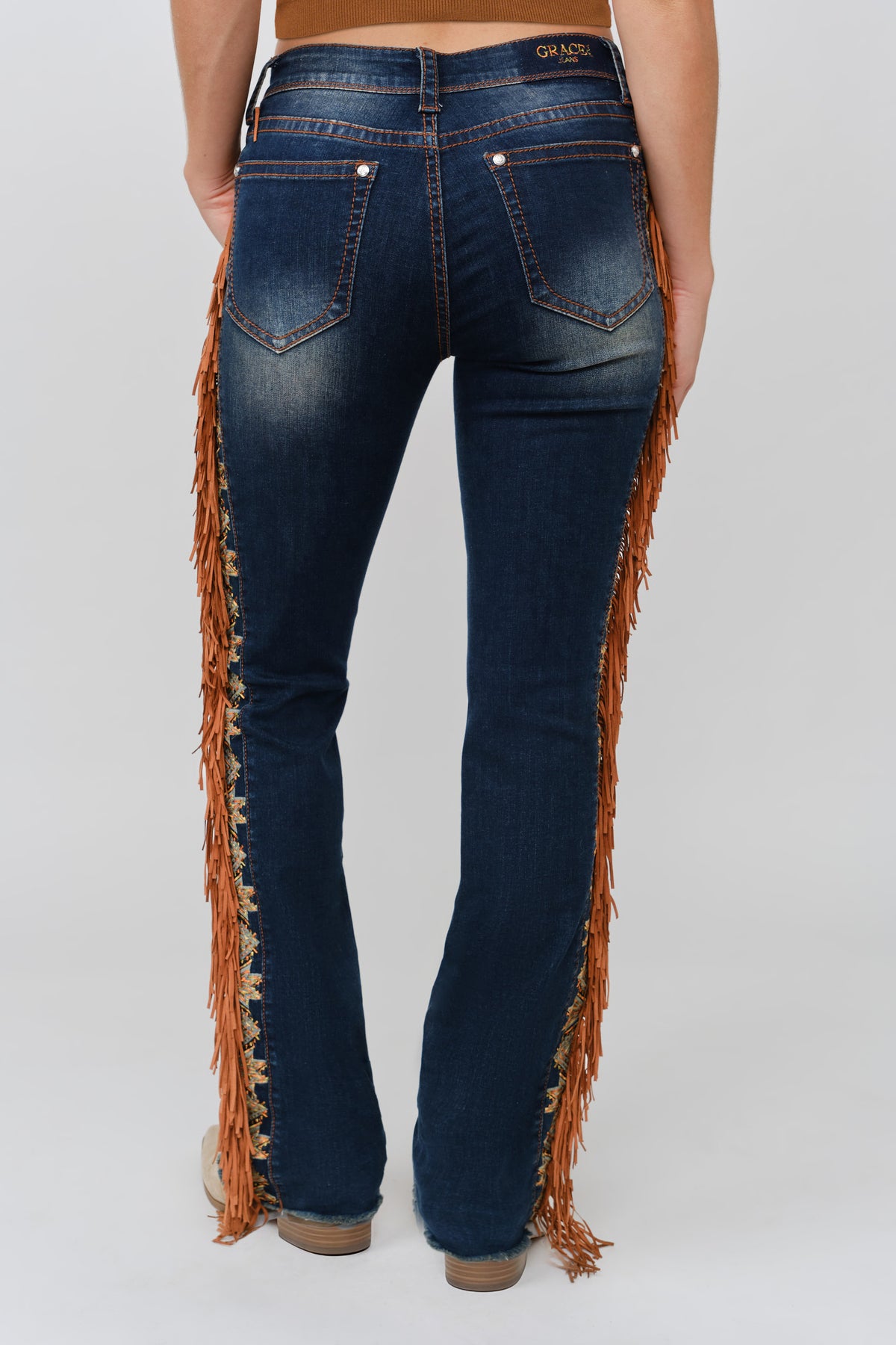 Grace in LA dark wash bootcut jeans front pocket detail with Aztec-inspired embroidery