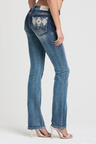 Grace in LA rhinestone jeans for women featuring silver and white crystal-embellished feather embroidery on the front pocket.