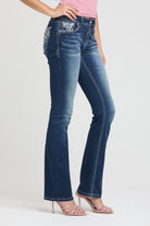Grace in LA embroidered jeans women featuring a western horseshoe motif on the back pocket with white floral embroidery and light pink rhinestone accents.