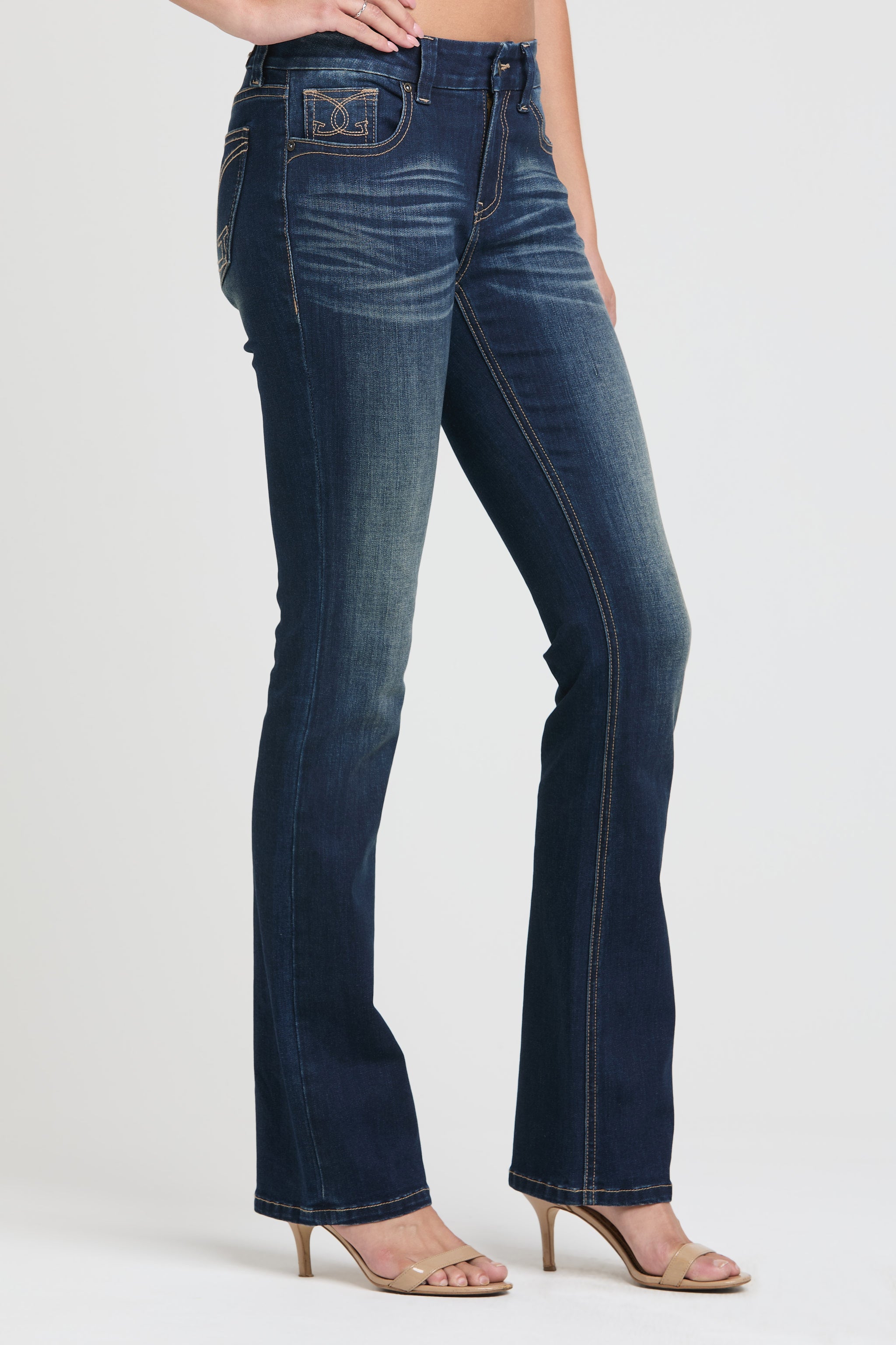 Grace in LA embroidered jeans women featuring a western paisley motif with bronze and metallic silver stitching on the back pocket.