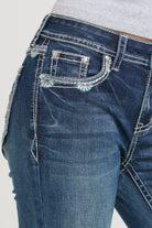 Grace in LA womens bootcut jeans featuring a side view of the front pocket detailed with white contrast stitching and turquoise crystal accents.