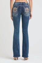 Grace in LA womens bootcut jeans featuring vertical silver lace-inspired embroidery along the outer side legs and a classic five-pocket design.