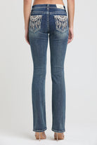 Grace in LA embroidered jeans women featuring a dark denim coin pocket with tan interlocking G logo stitching.