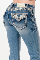 Grace in LA embroidered jeans women featuring cream floral yoke and flap pocket designs with a branded gold metallic waist patch.