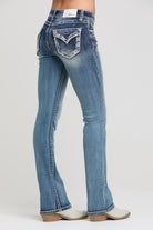Grace in LA bootcut jeans back pocket detail featuring border stitches and faux flap with rhinestones