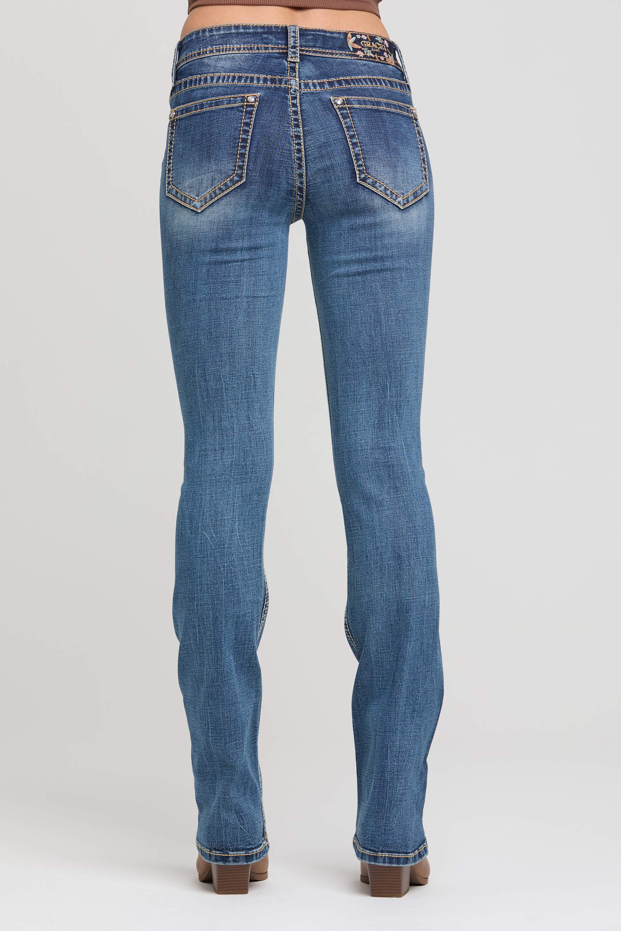 Grace in LA women's medium wash five-pocket bootcut jeans in a slim easy fit