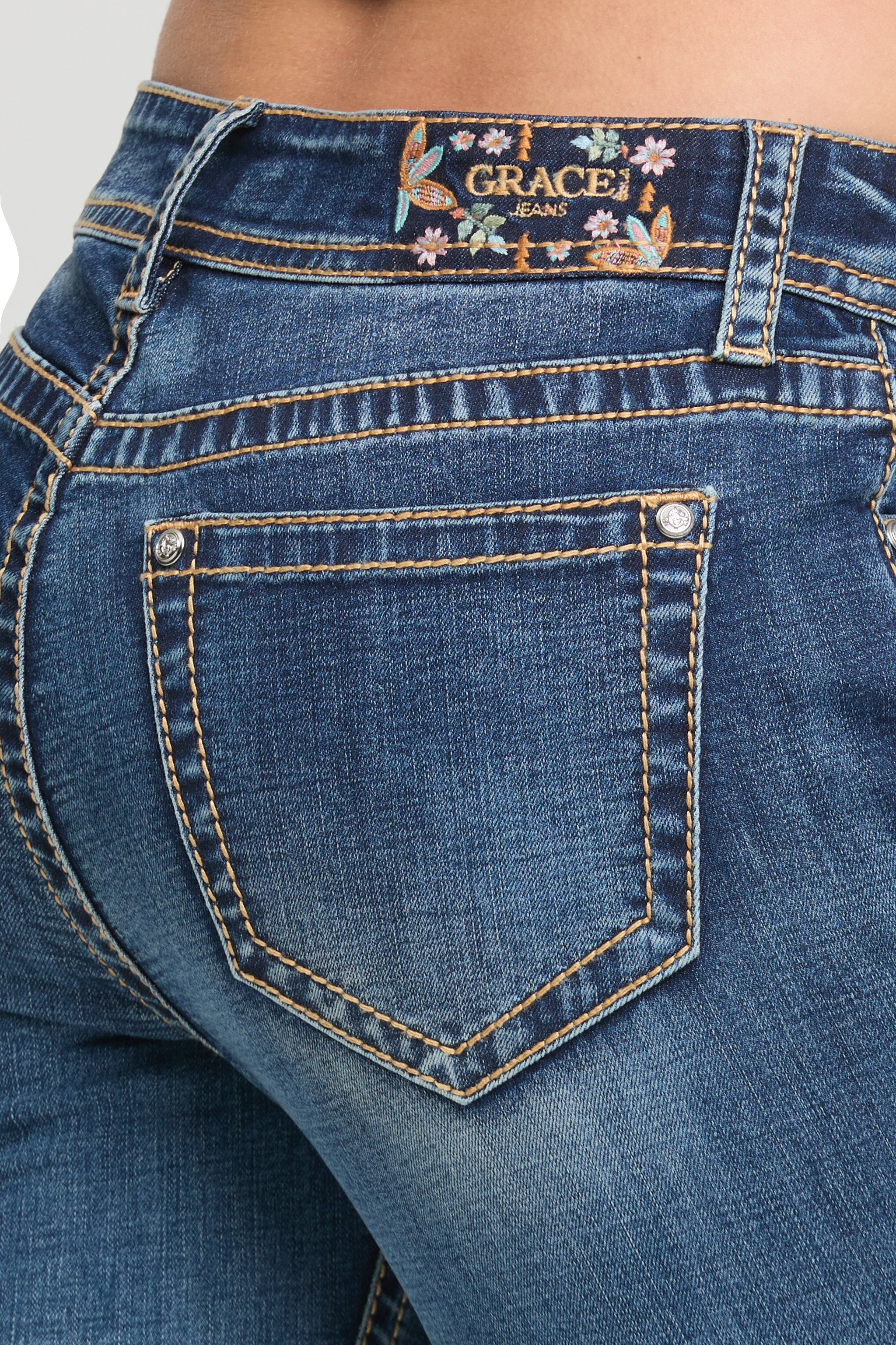 Grace in LA women's medium wash mid-rise bootcut jeans with classic five-pocket styling, front-facing view
