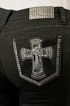 Grace in LA bedazzled jeans women in a sleek black denim finish featuring large rhinestone cross patches on the back pockets.
