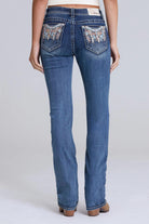 Grace in LA bootcut jeans close-up of colorful dreamcatcher feather embroidery on medium wash denim