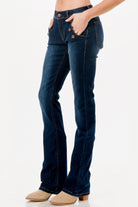 Grace in LA cowgirl jeans for women in a dark flare fit with unique button-front pocket detailing.