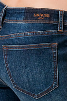 Buttons Detail Contemporary Mid Rise Bootcut Jeans Grace in LA