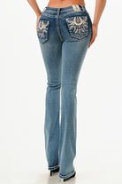 Grace in LA embroidered jeans women in a bootcut silhouette featuring a blue and white feathered dreamcatcher design on the back flap pockets.