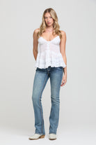 Grace in LA bootcut jeans full rear view with symmetrical western embroidery on both back pockets