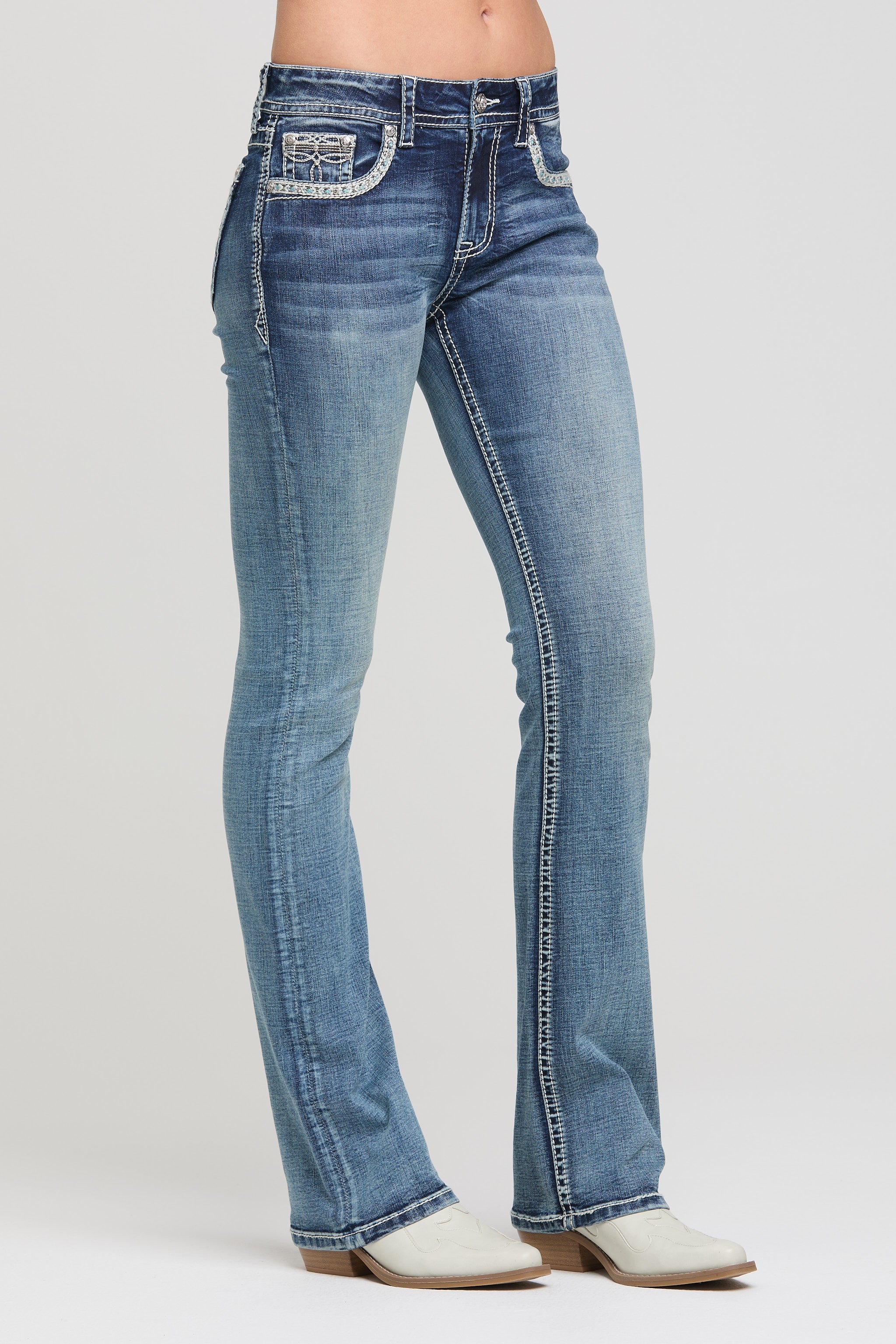 Grace in LA women's medium wash western embroidered bootcut jeans styled for a casual look