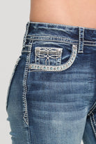 Grace in LA bootcut jeans close-up of western embroidery on medium wash denim