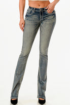 Grace in LA womens bootcut jeans in a vintage medium wash with whiskered front and rhinestone pocket accents.