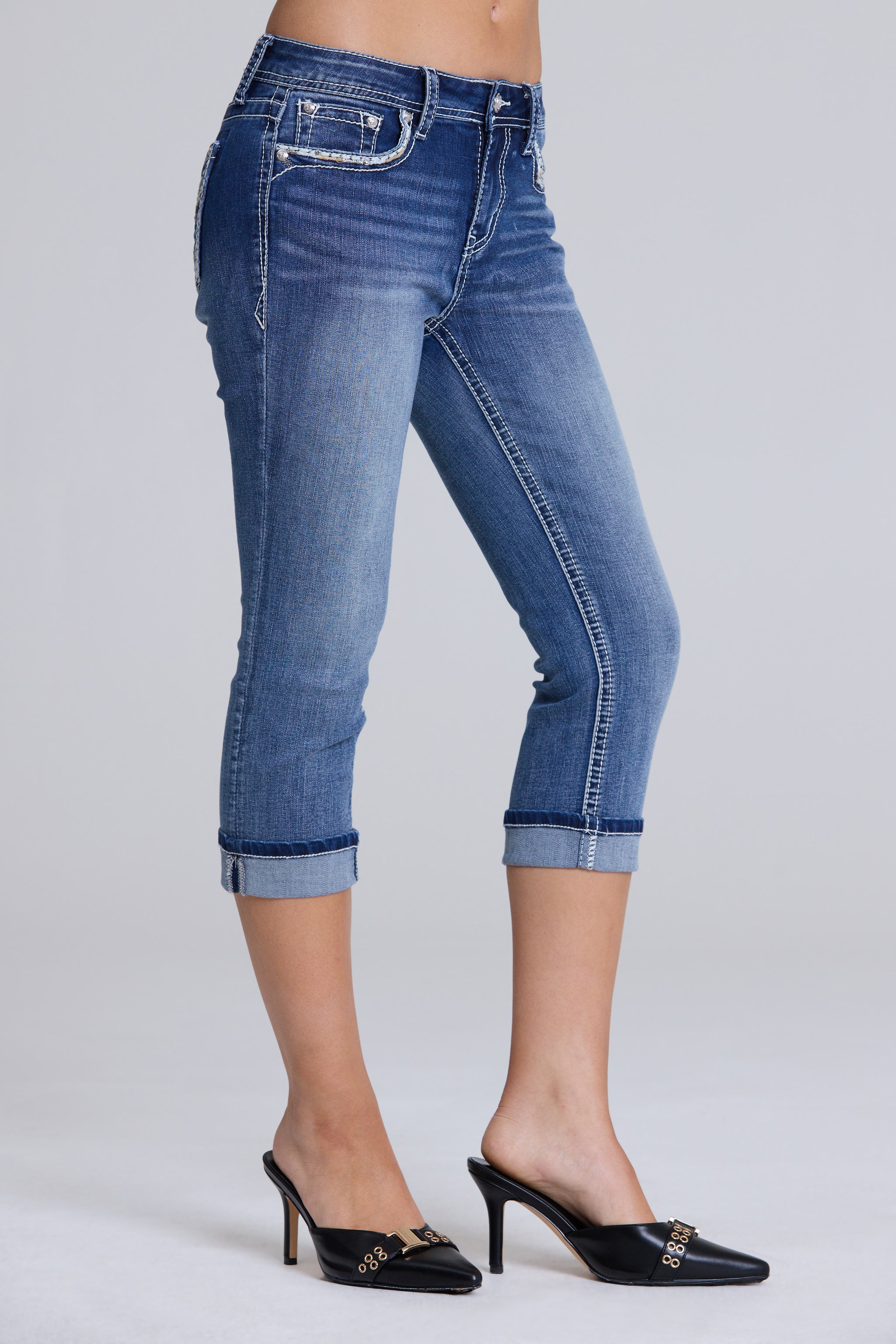 Grace in LA women's medium wash capri jeans back pocket detail featuring intricate geometric embroidery and crystal rhinestones