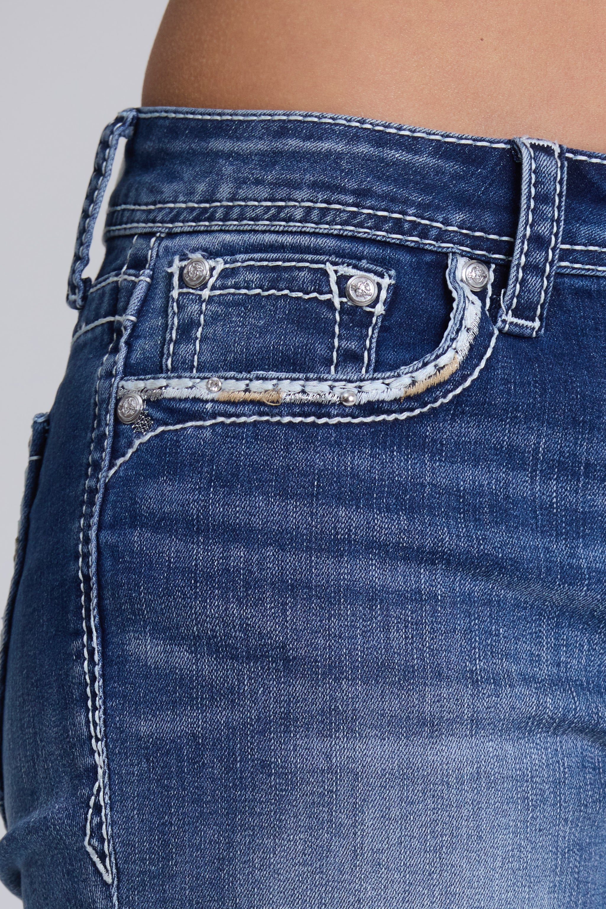Grace in LA women's medium wash mid-rise geometric embroidered capri jeans, front-facing view with hand-set rhinestone accents