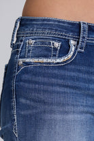 Grace in LA women's medium wash mid-rise geometric embroidered capri jeans, front-facing view with hand-set rhinestone accents