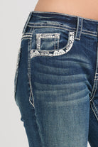 Grace in LA embroidered jeans women featuring a vibrant floral bouquet design on the back pocket with a branded "Grace" leather waist patch.