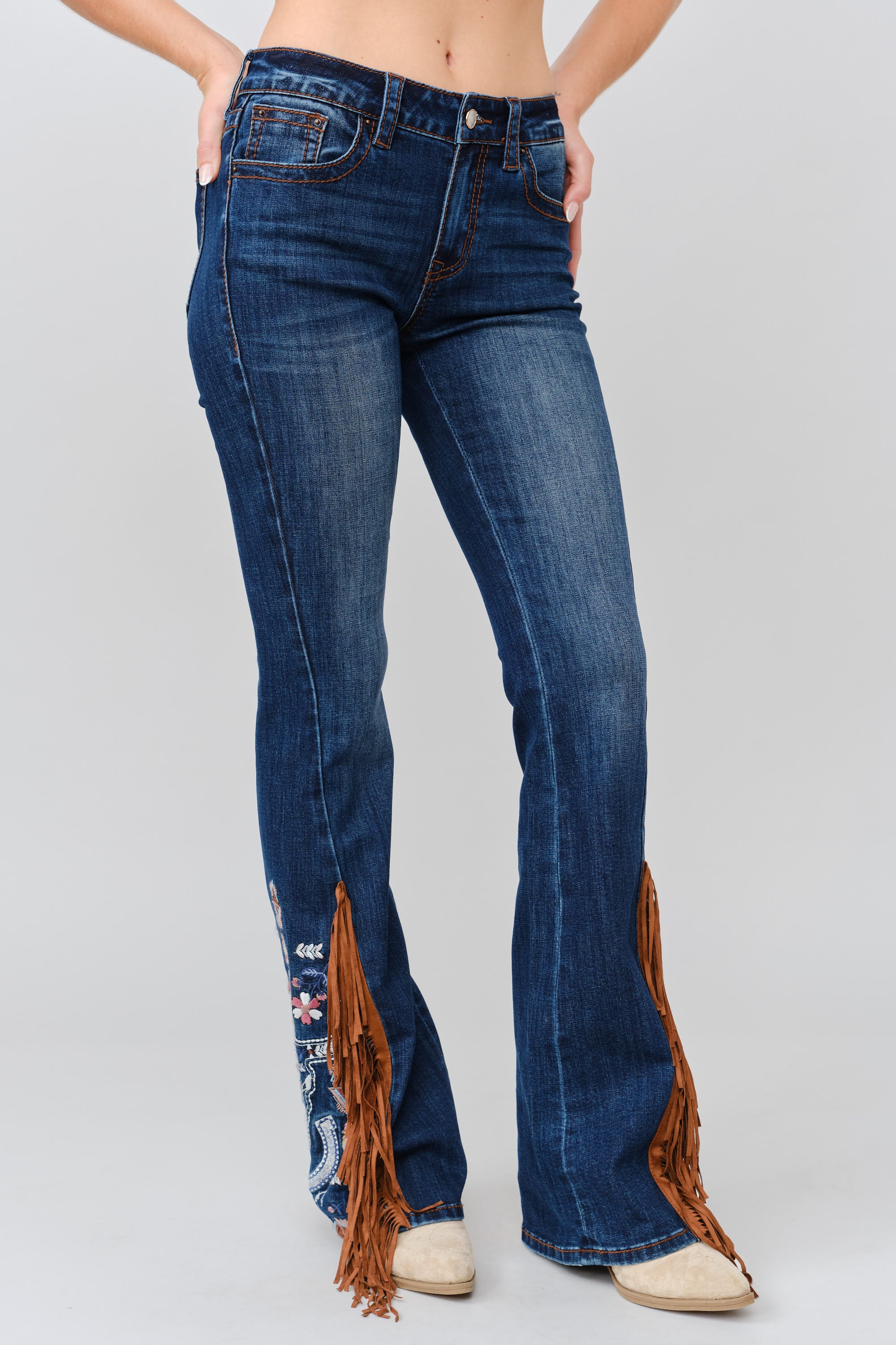 Grace in LA women's medium wash bootcut jeans, full-length front view styled for a casual western-inspired look