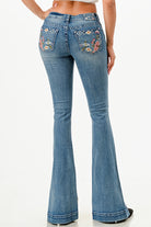 Grace in LA womens bootcut jeans in a dark denim with classic western pocket styling and a slim fit.