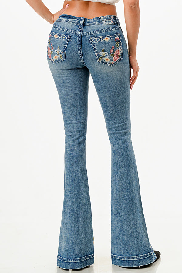 Grace in LA womens bootcut jeans in a dark denim with classic western pocket styling and a slim fit.