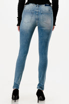 Grace in LA western jeans for women in a light wash featuring a high-waisted skinny fit and a smooth full-length rear silhouette.