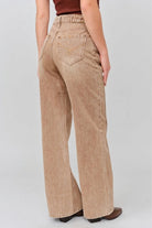Grace in LA women's light wash flare jeans, front-facing view showing the fitted waist and flared leg silhouette