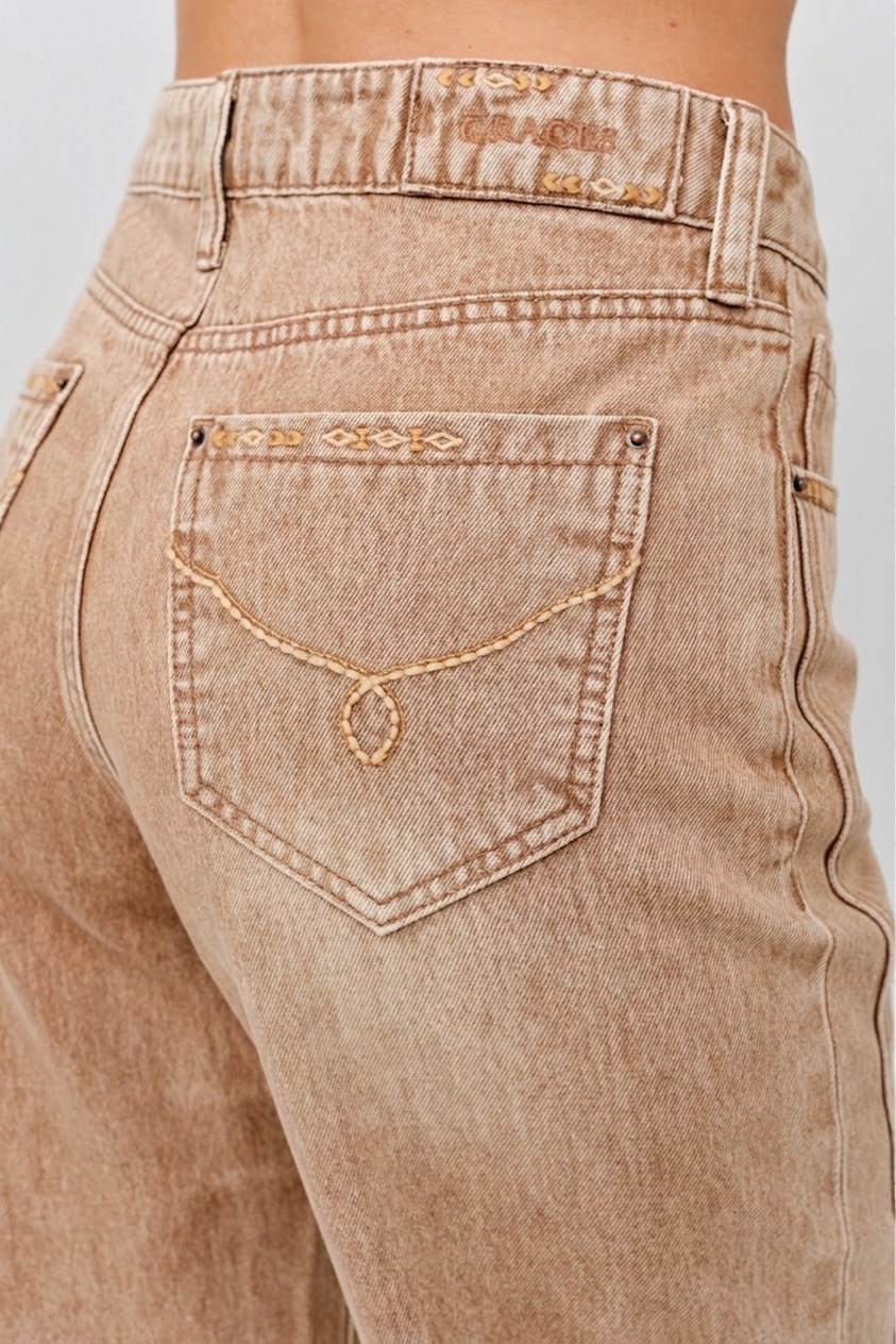 Grace in LA women's light wash flare jeans, close-up rear view showing the back pockets and denim detailing