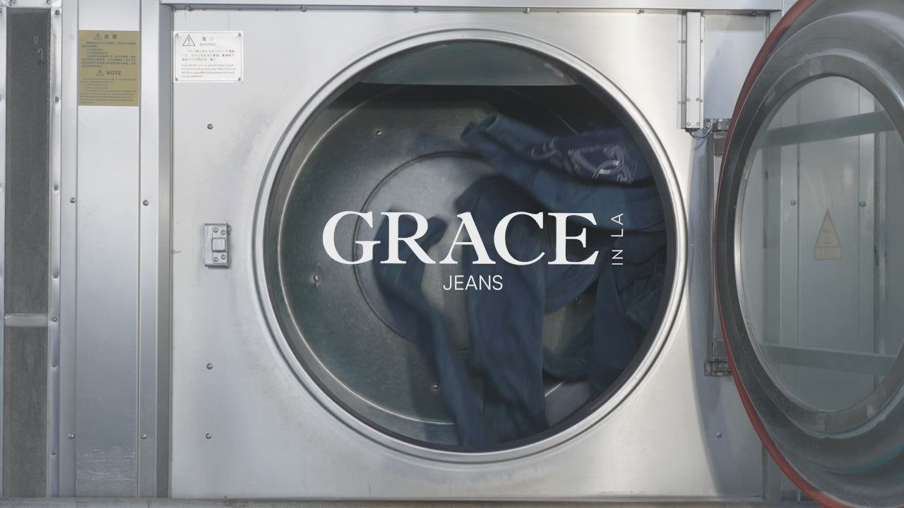 Video thumbnail showing denim jeans inside an industrial washing machine with Grace in LA logo overlay