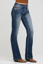 Grace in LA bootcut jeans full rear view with cross and floral appliqué on both back pockets